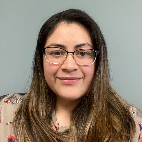 Portrait of Nydia Rivera, Financial Assistant at CM Services