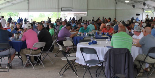 People sitting enjoying The TCC Annual Dinner Golf Outing