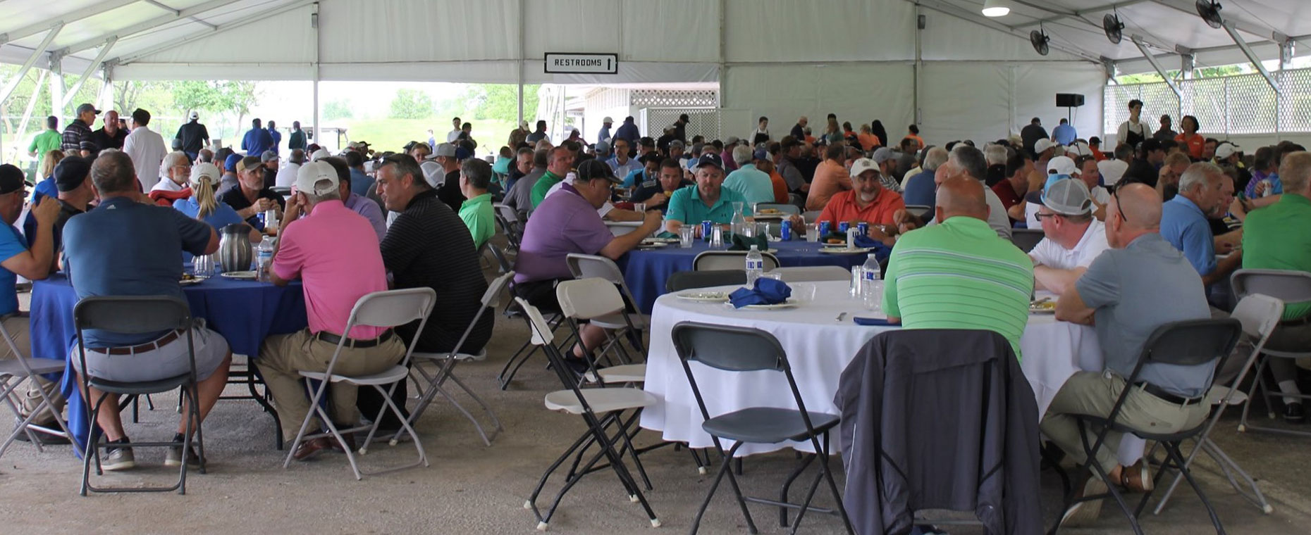 People sitting enjoying The TCC Annual Dinner Golf Outing